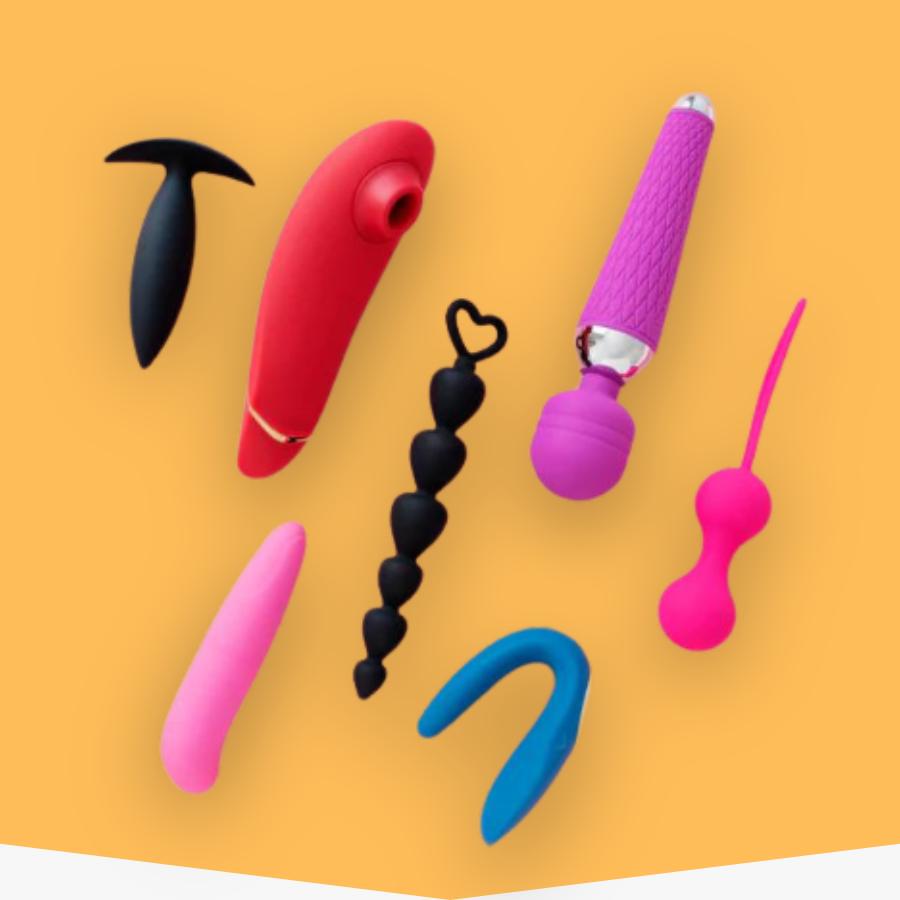 various sex toys on an orange background