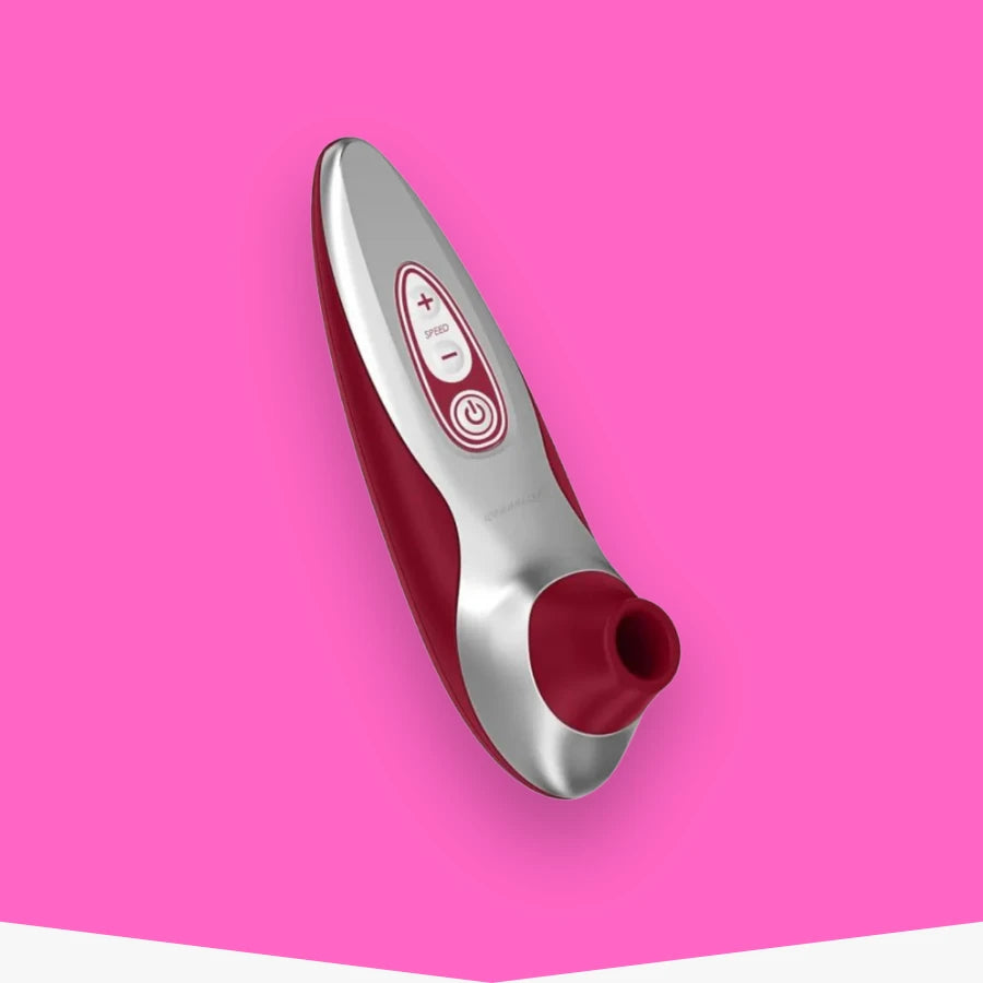 Clitoral Suction Vibrator on a pink background