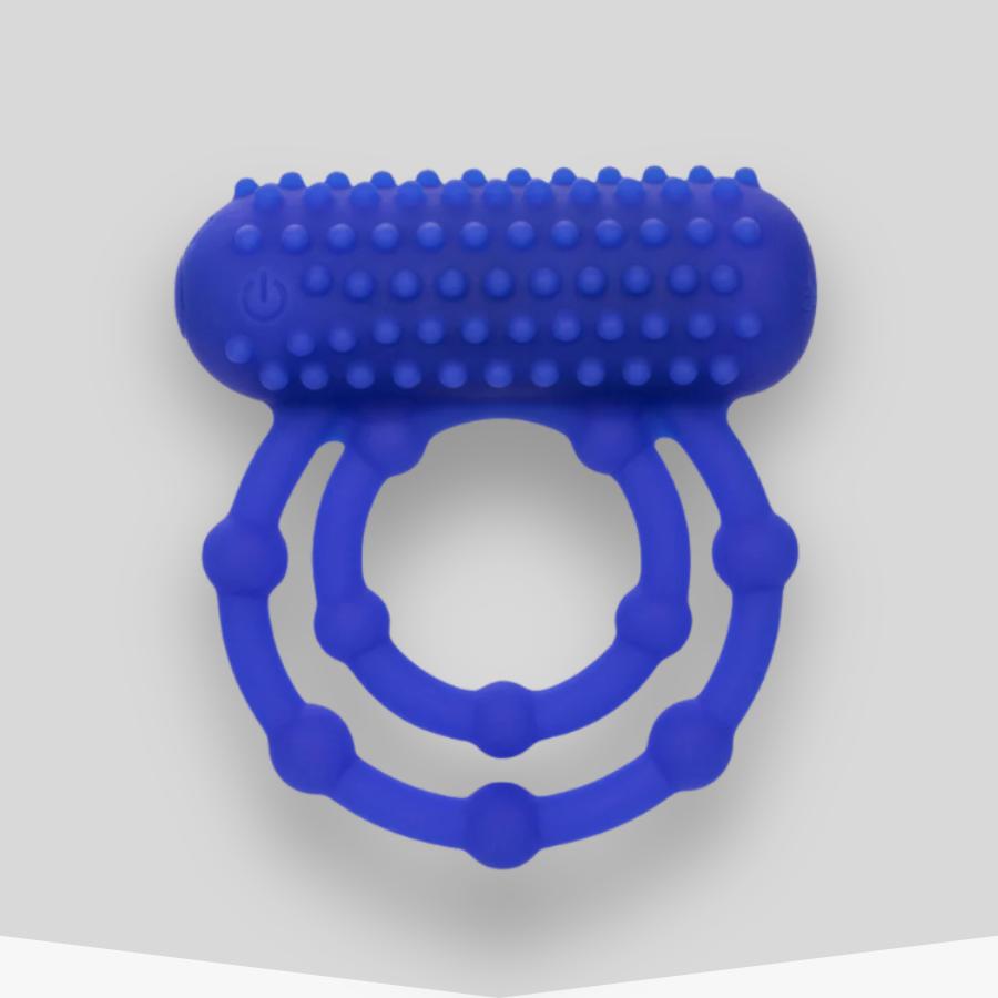 Blue cock ring on a grey background